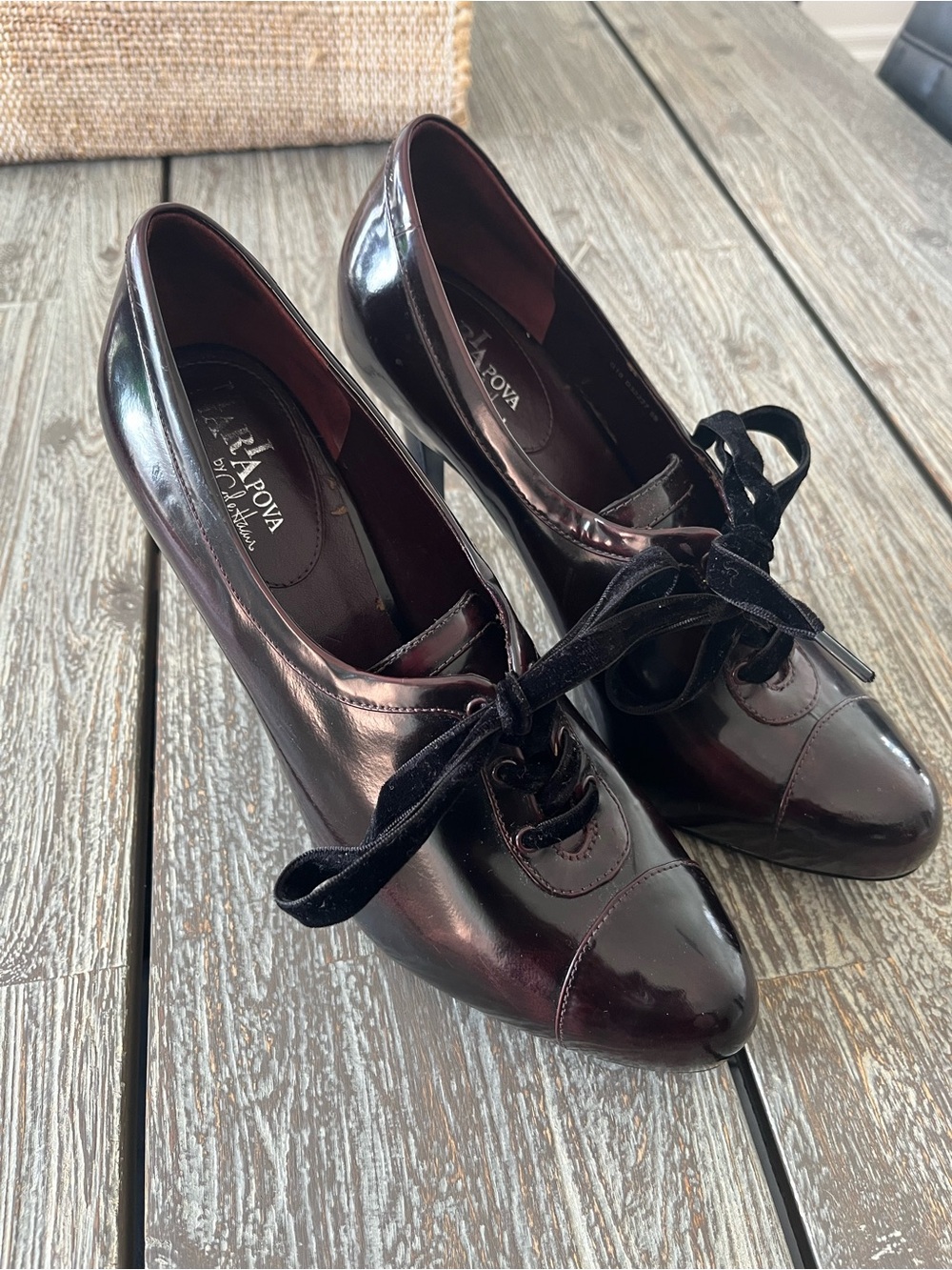 COLE HAAN striking stilettos with lace up detail, size 9.